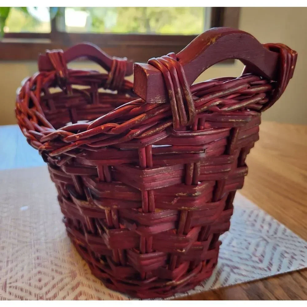 Red basket with wood handles